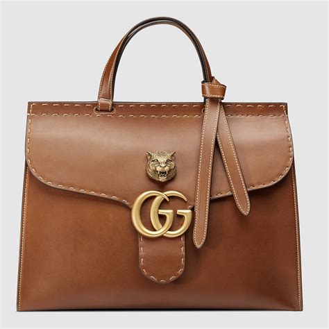 gucci logo top handle tote|Gucci marmont top handle bag.